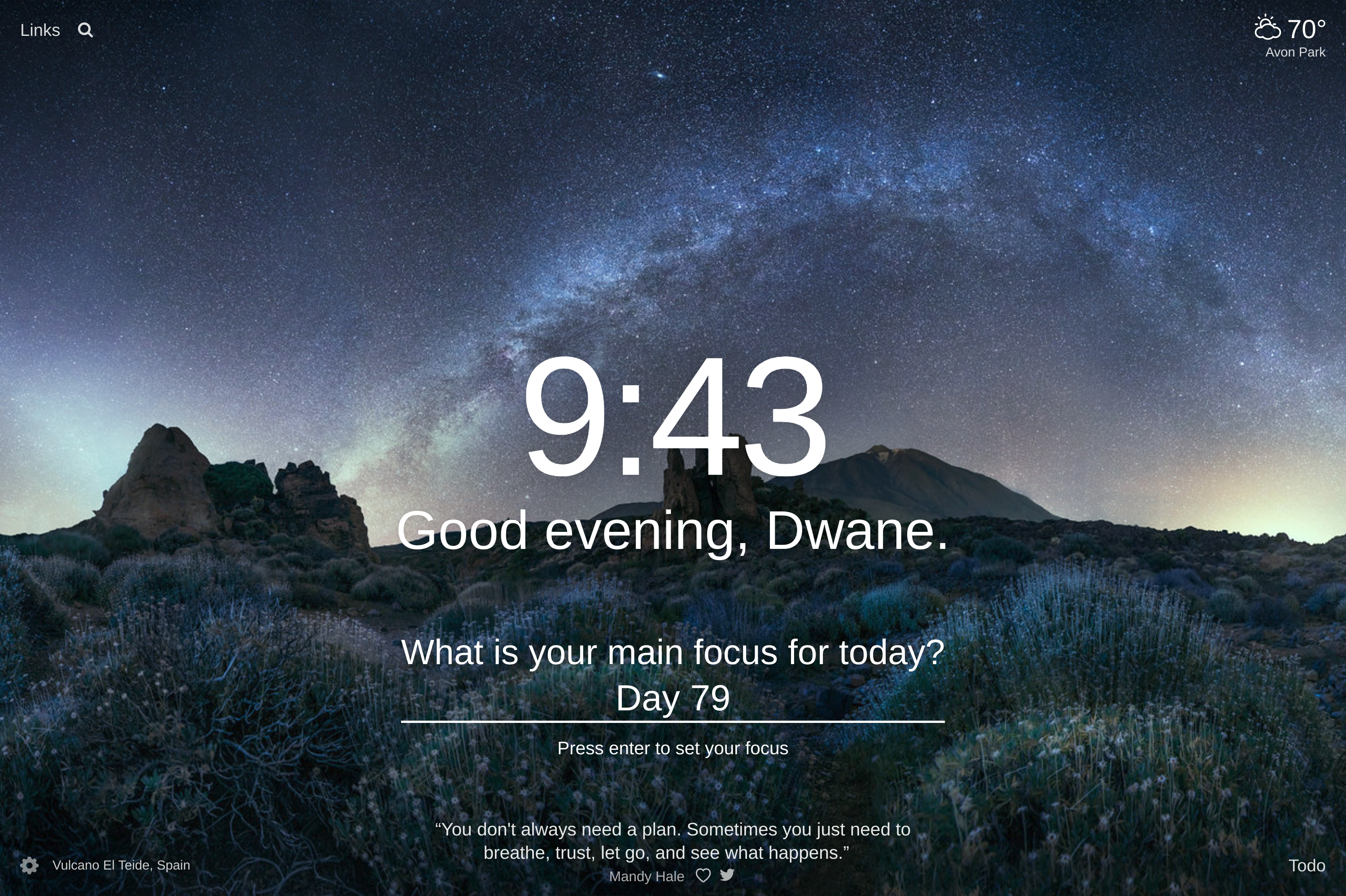 Vulcano El Teide, Spain at night with a grassy plain and mountatins in the distance