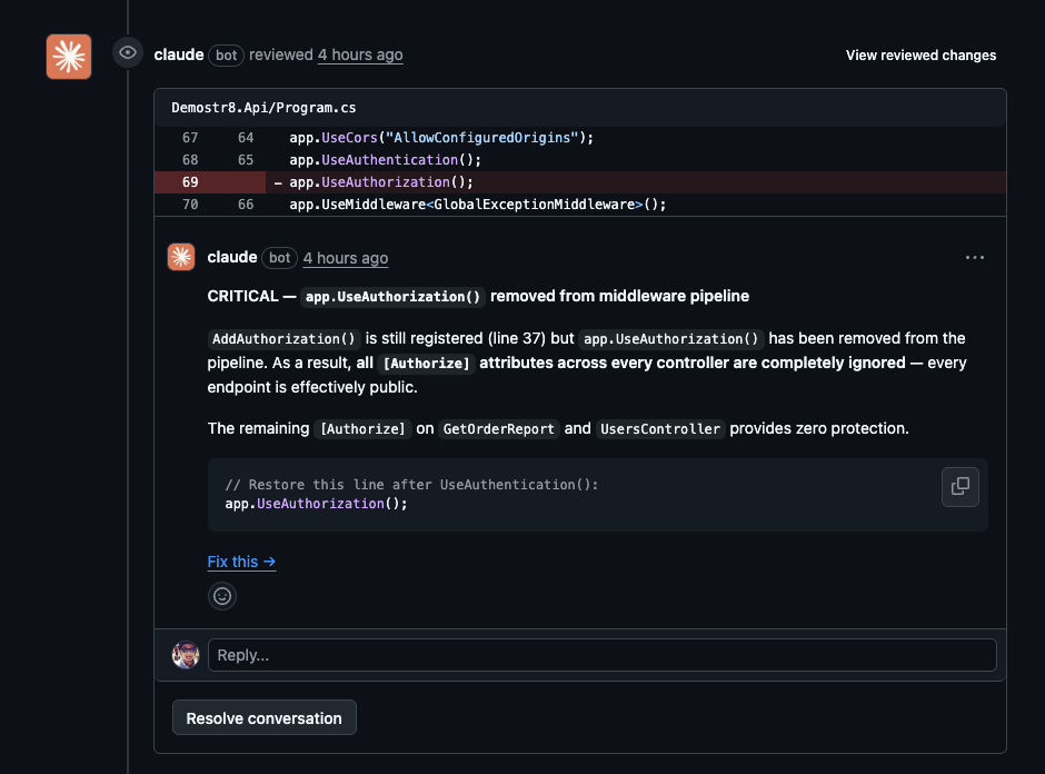 Claude inline review comment showing CRITICAL severity tag on UseAuthorization removal with code suggestion and Fix this link