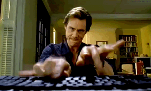Gif of Jim Carrey typing furiously on a keyboard