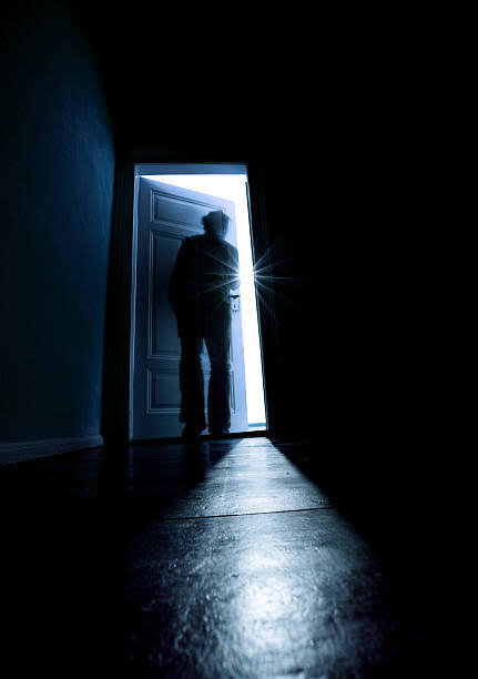 Image description of a man opening a dooe