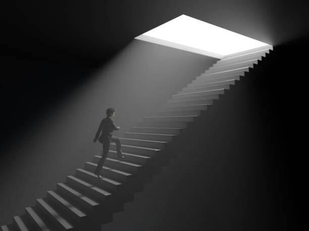 Image of a man climbing a staircase