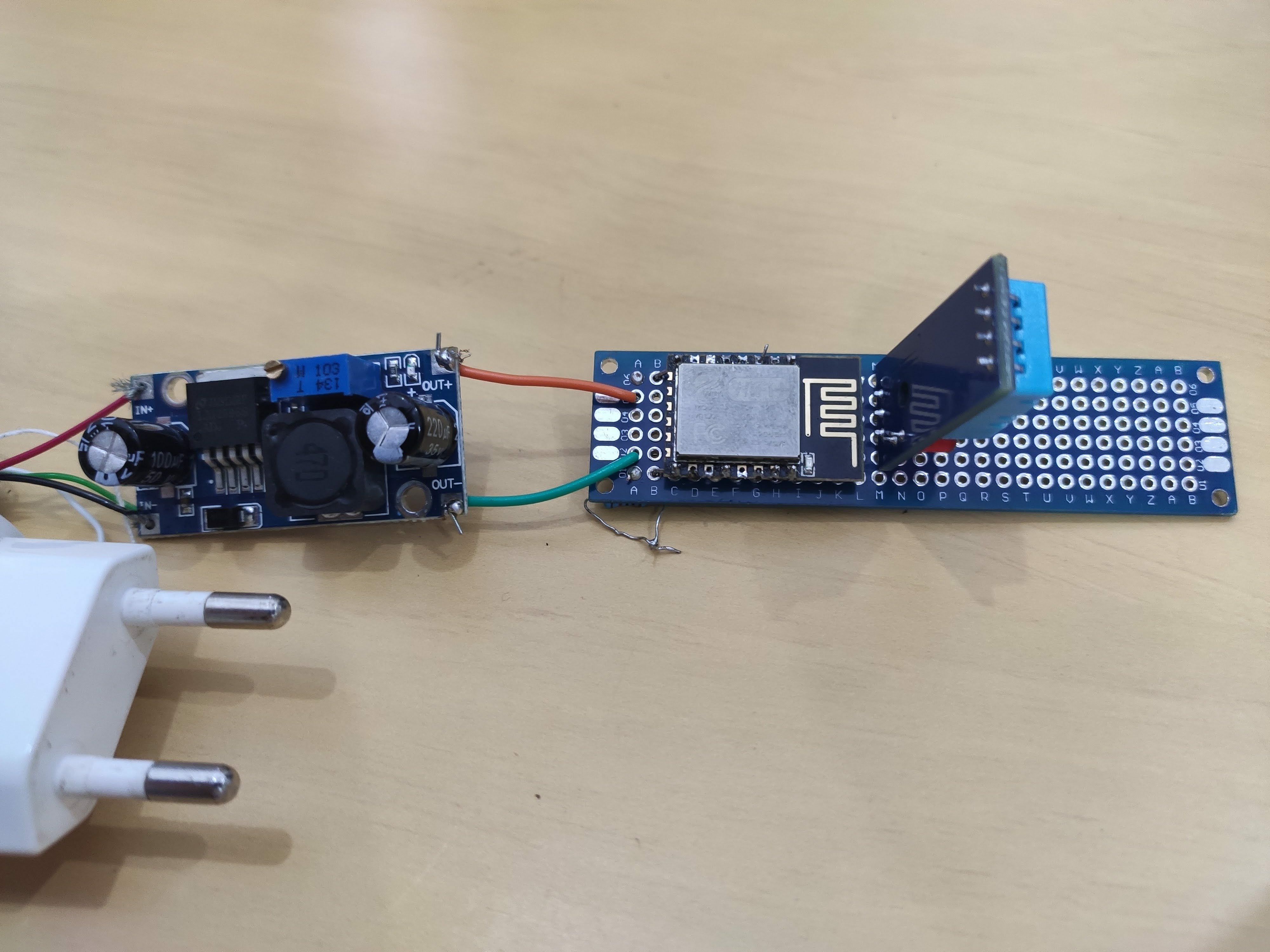 Image of the welded final setup of my ESP with a tension regulator and the DHT sensor.